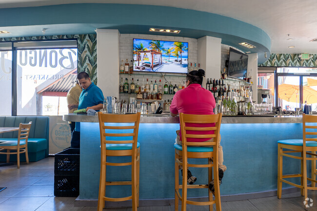 Grab a delicious bite at the local favorite Bongo Johnny's Patio Bar & Grill near Warm Sands.
