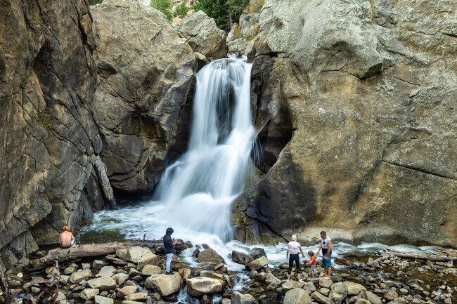 Boulder Falls Trail leads to a flowing waterfall along Middle Boulder Creek.