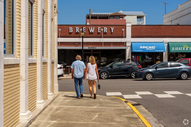 Minutes from Central Mainland, locals gather on Canal Street for food and live entertainment.
