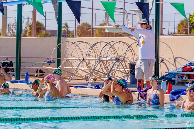 The Lightning swim team going over drills at the Lake Lytal pool in Royal Palm Estates.
