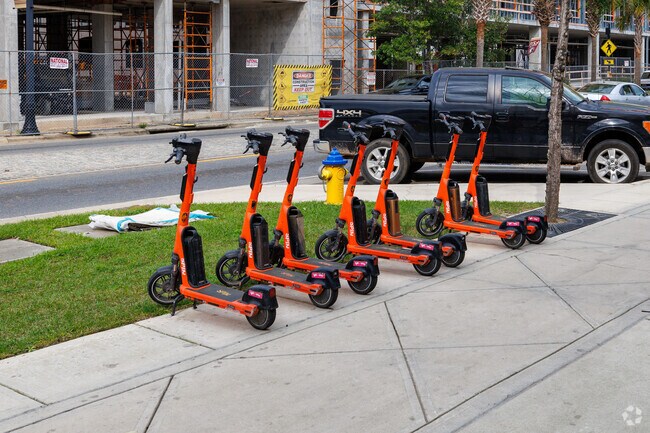 An alternative to public transportation, the orange scooters can be found throughout Levy Park.