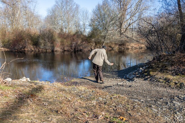 Skip some stones on the Charles River in The Manor.