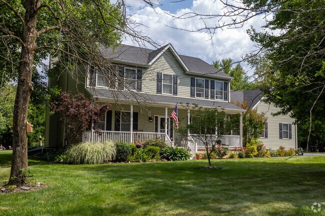 Colonial homes in Groveville often feature spacious front porches.