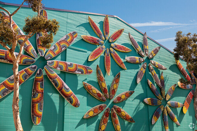 Surfboard murals can be found decorated on the side of the Pacific Beach Recreation Center.
