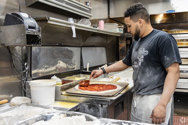 Residents of Chartiers vist Doughboy's Pizza just outside of the neighborhood.