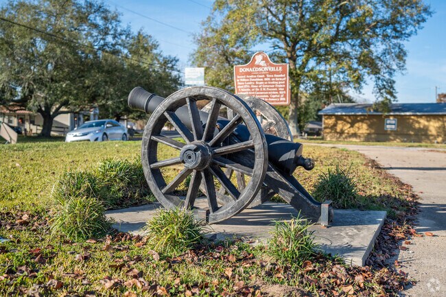 A decorative cannon sits alongside the road near Darrow, Louisiana.
