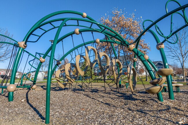 Let your kids climb the playground equipment at Conservancy Commons Park in DeForest.