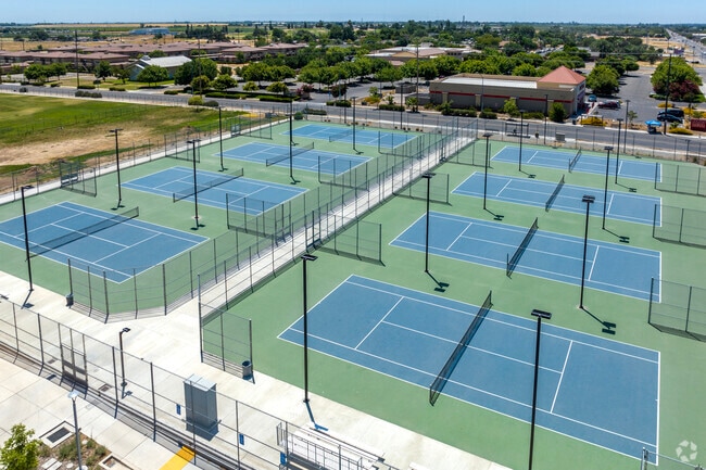 Students have access to tennis courts at Edison High School in Fresno.