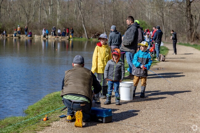 Teaching children the importance of safety when fishing at the Kids' Fishing Derby.