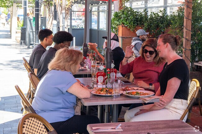 Diners savor delicious crepes at Crepevine Restaurant in Burlingame Terrace.