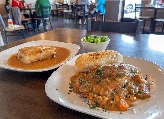 Order the blackened catfish and bread pudding at Jasmine's Bayou.