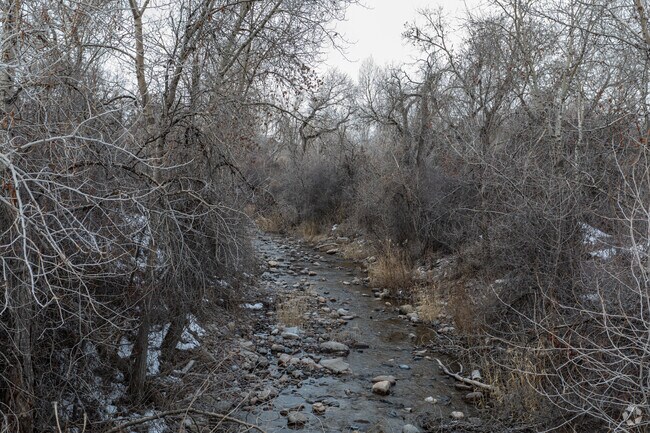 The American Fork River flows along the edge of Highland Glen Park in Highland.