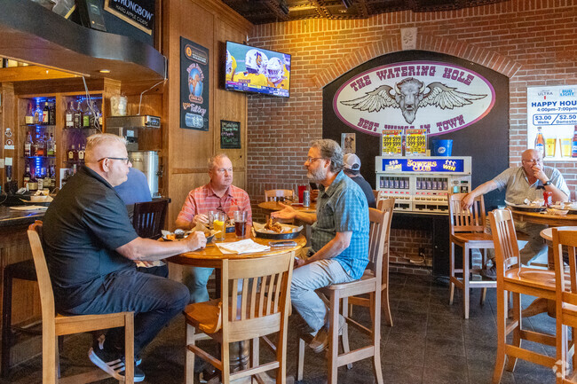 West A residents raise a glass to good times at The Watering Hole West.
