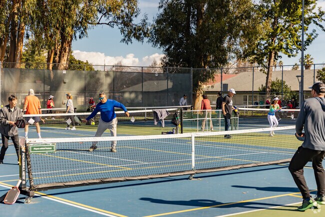 Enjoy a pickleball match at Mitchell Park in the South of Midtown neighborhood.