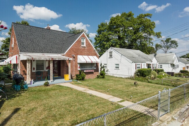 Minimal traditional homes in Forestville feature brick or siding exteriors and gable roofs.