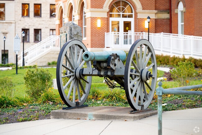 A historic cannon stands outside the Marshall County Courthouse.