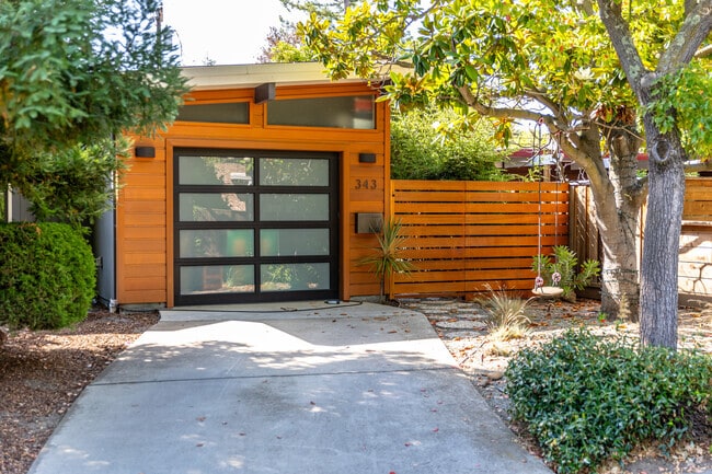 Slanted roofs, triangular windows and redwood siding are all staples of the neighborhood homes.