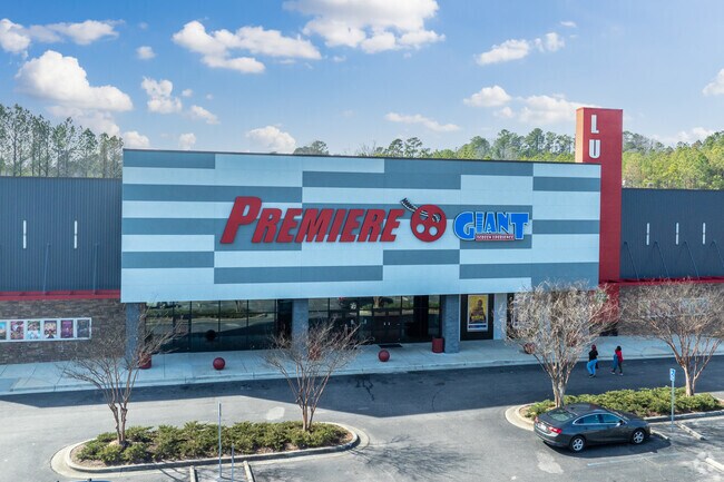 Enjoy a movie with a friend at Premiere Cinemas near Garden Highlands.