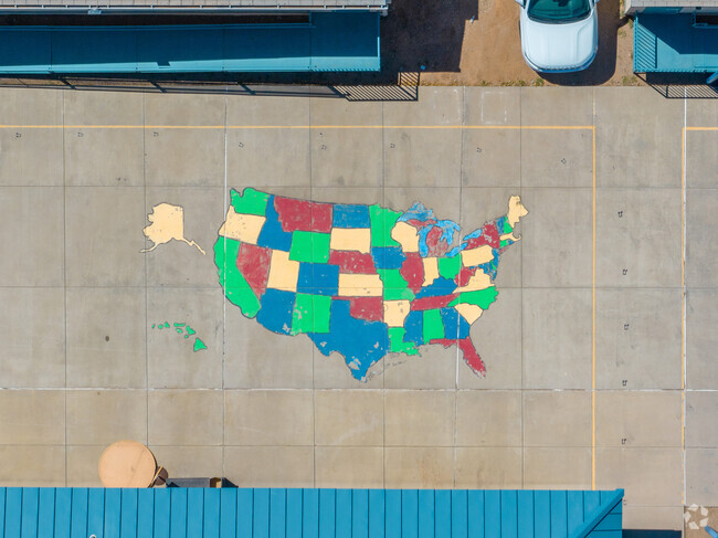 Augusta Ranch Elementary School is decorated with a creative mural of the country.