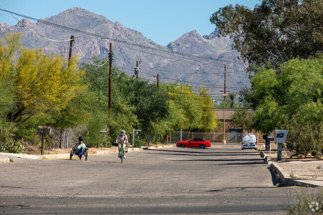 Bicyclists enjoy wide streets in Cabrini.