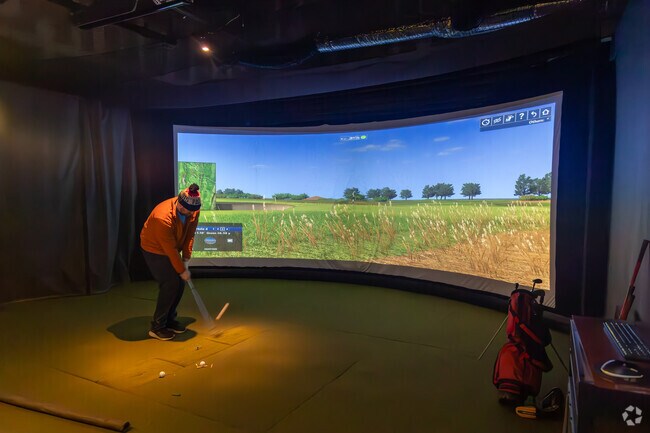 Get your swing on at Sim-City Indoor Golf near Mason Corner.
