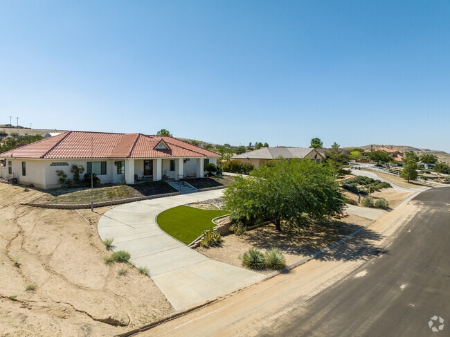 Contemporary single family homes with long driveways sit in the Southeast Antelope Valley.