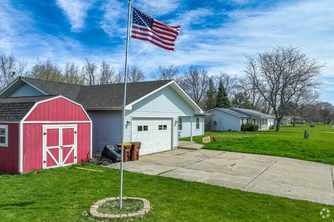 Many homes near downtown Paw Paw have garages and detached barns for storage.