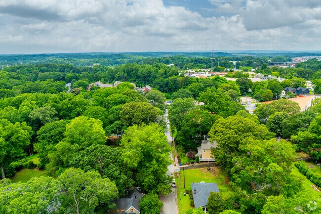 Knight Park-Howell Station boasts lush greenery and tight-knit layout, with rows of homes nestled beneath a canopy of mature trees.