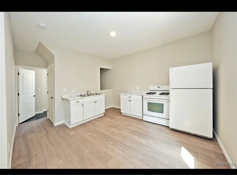 275 Genesee St unit lower, Lockport, NY 14094 - photo 1