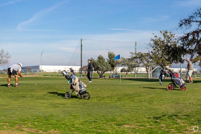 Play a round of golf at Airways Golf Club near the Tarpey neighborhood.