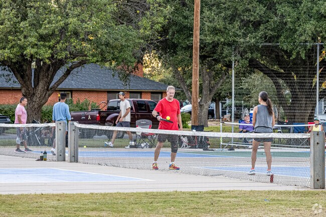 The Country Club neighborhood is perfect for those who enjoy outdoor activities like tennis.