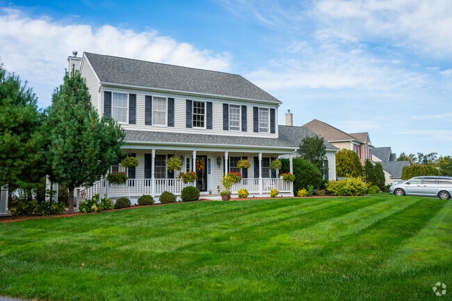 Wrap-around porches are a common sight throughout developments in Plainville.