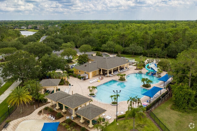 A large resort-style pool with a slide is a highlight for Live Oak Reserve residents.
