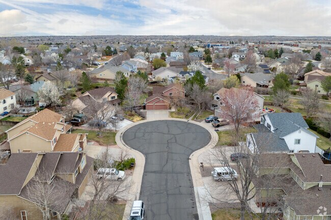 Holly Point homes sit on quiet roads with wide sidewalks and cul-de-sacs.