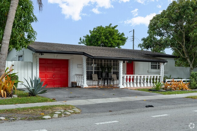 Diverse homes in various colors add vibrancy to the neighborhood.