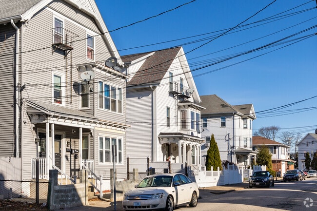 Many Colonial style homes near Downtown Pawtucket are now converted to multi family units.