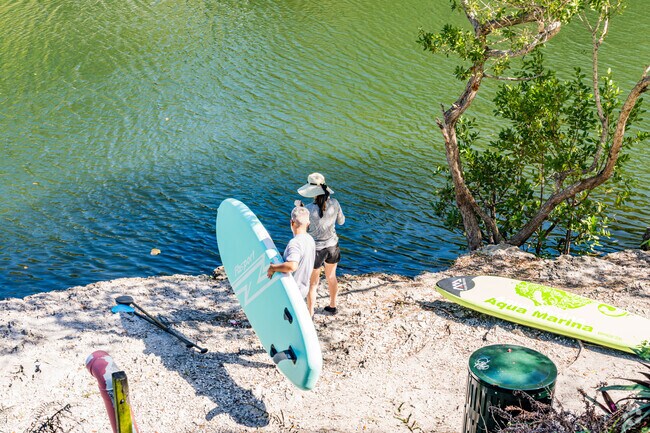 Stand up paddling is a fun activity for Cocoplum residents to enjoy.