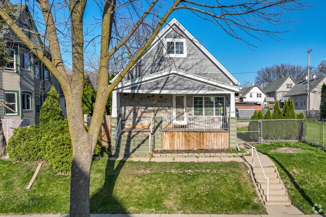 A perfect Tudor home stands proudly in the Mitchell Street neighborhood.