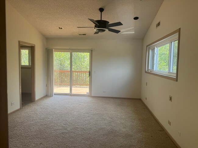 Master Bedroom w/ Patiodoor access to Balcony