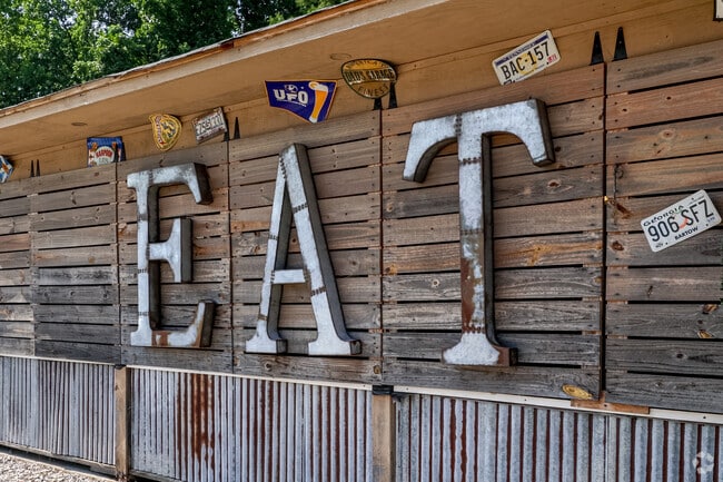 Indulge in the exquisite menu and diverse selection of drinks at The Palmetto Oyster House.