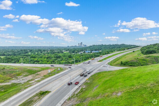 The LL Tisdale Expressway and Gilcrease Expressway connect Walt Whitman to the Tulsa area.