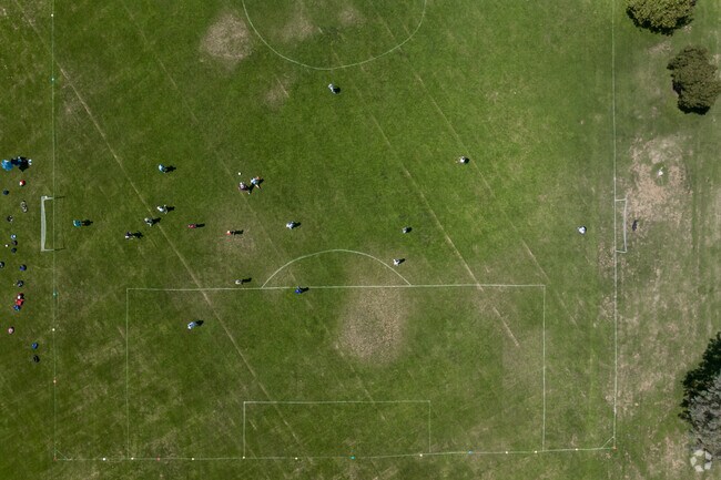 Locals play a friendly game of soccer at Greer Soccer Field.