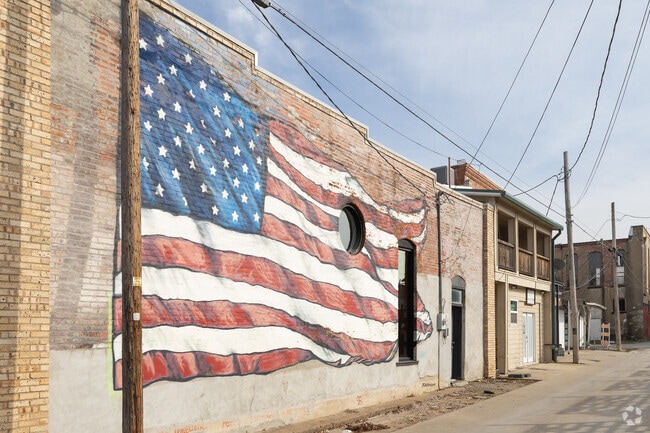 A vibrant flag mural decorates a wall in Van Alstyne’s downtown.