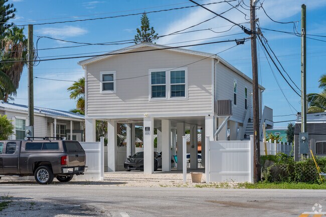Newly built homes in Stock Island are elevated to protect themselves from flooding.