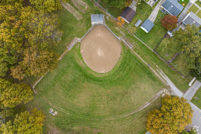 Gather for a game of baseball at Lions Park, near the Brentwood Park neighborhood.