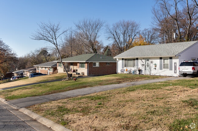 Brick and vinyl homes lining the neighborhood streets of Breckenridge Hills.