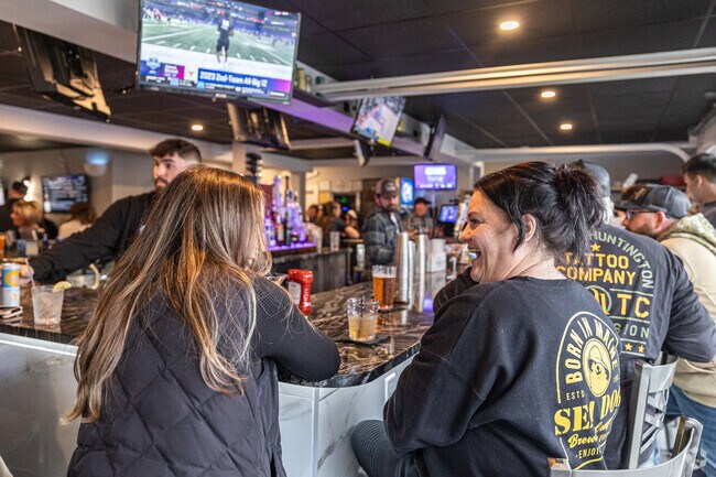 Locals rant and rave with one another when hanging out at the Sandbar Beach Club in Tyngsborough.