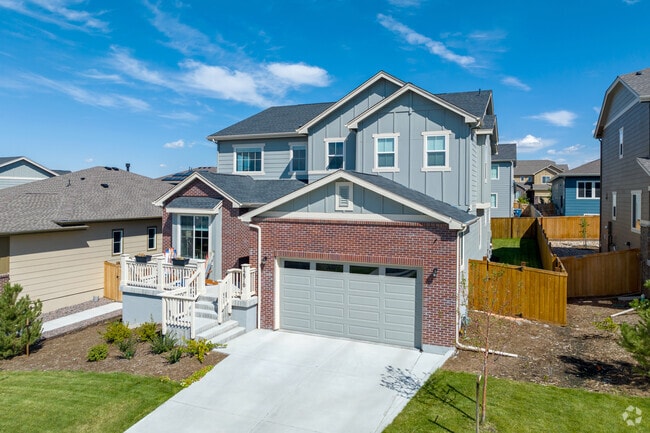 Craftsman-style homes offer large driveways and two-car garages in Harmony Park.