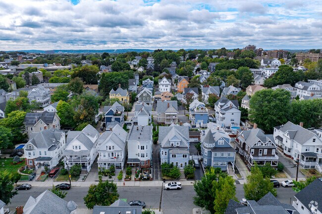 Beautiful colorful townhomes line the various streets of Winter Hill in Somerville.