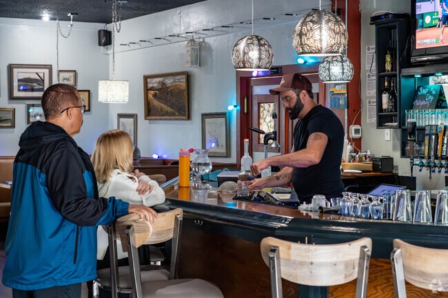 Enjoy a freshly made cocktail while waiting for your table at Veg+ in Boston Heights.